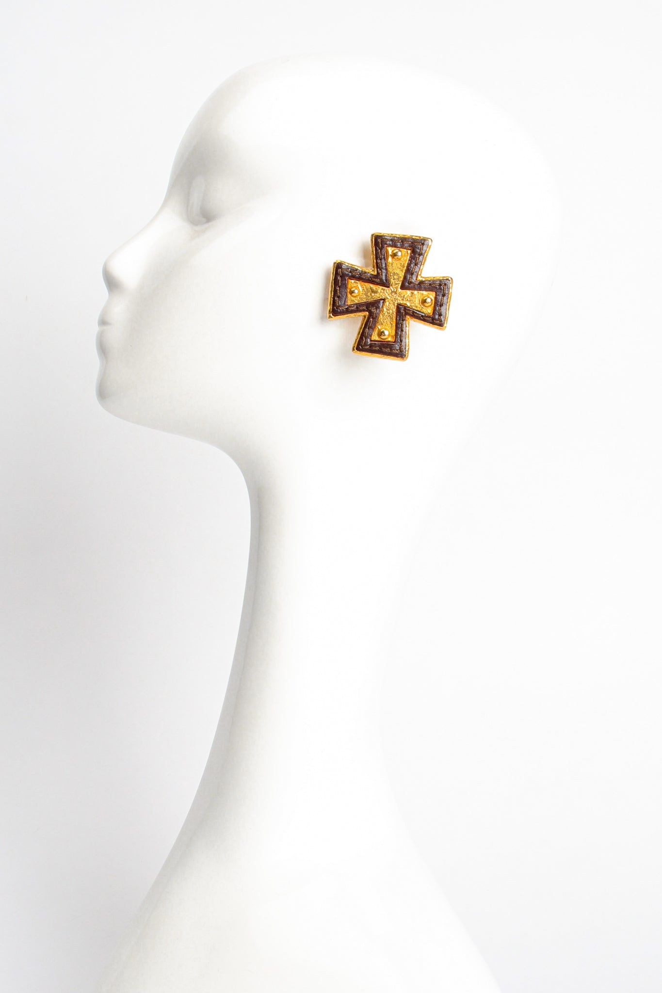 Vintage Christian Lacroix Leather Cross Earrings on Mannequin at Recess Los Angeles