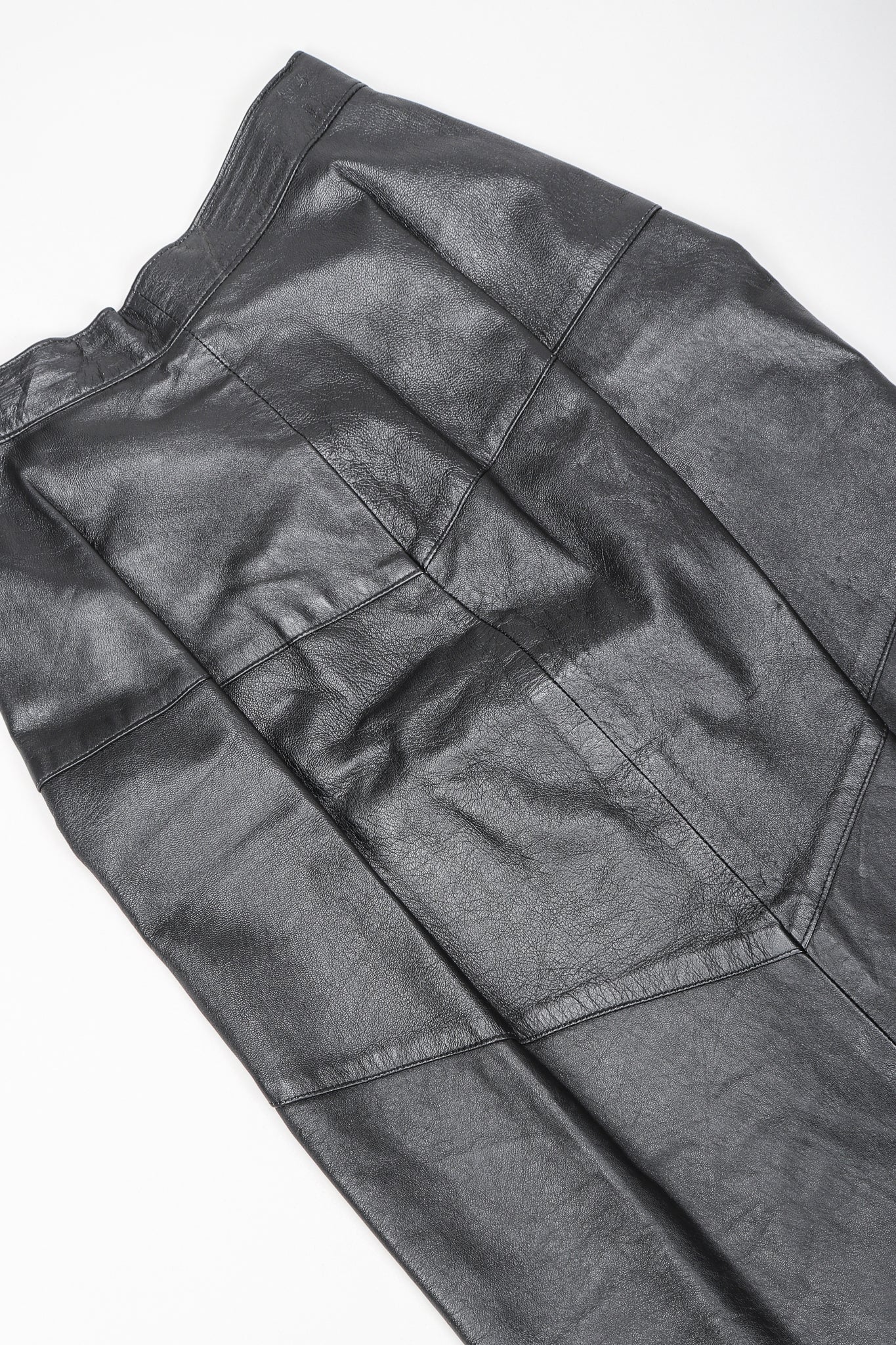 Dero Enterprises Black Leather Skirt, back Detail On White Background at Recess Vintage