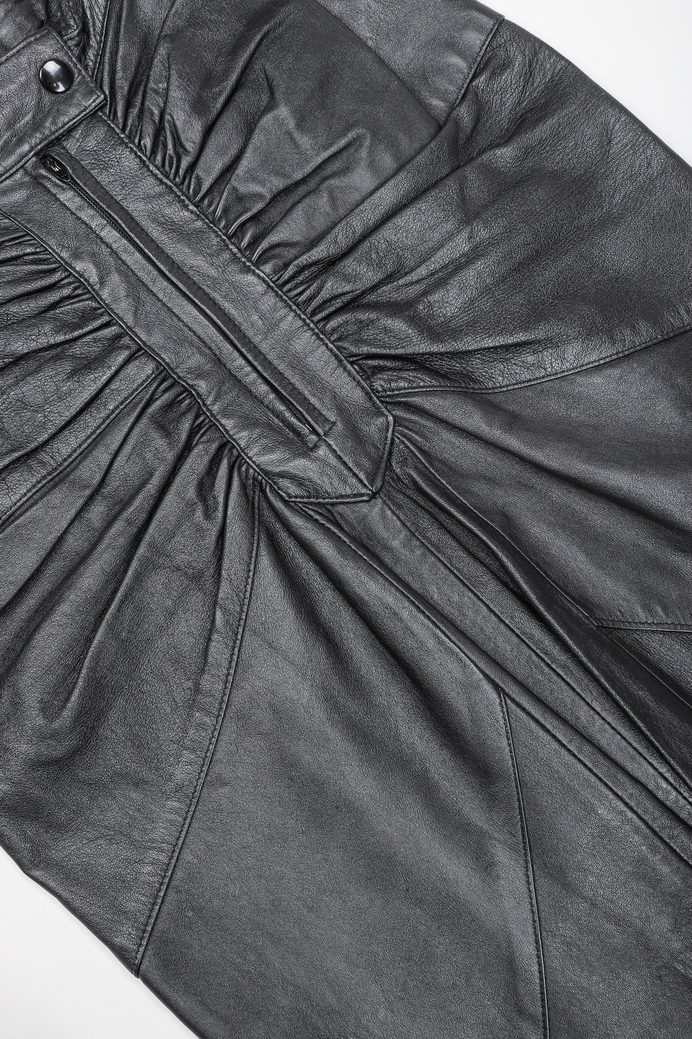 Dero Enterprises Black Leather Skirt, Front Detail On White Background at Recess Vintage