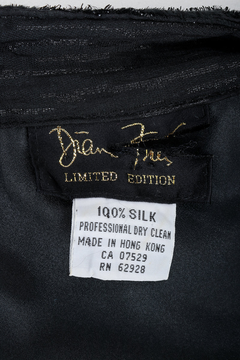 Recess Vintage Diane Freis label on black fabric