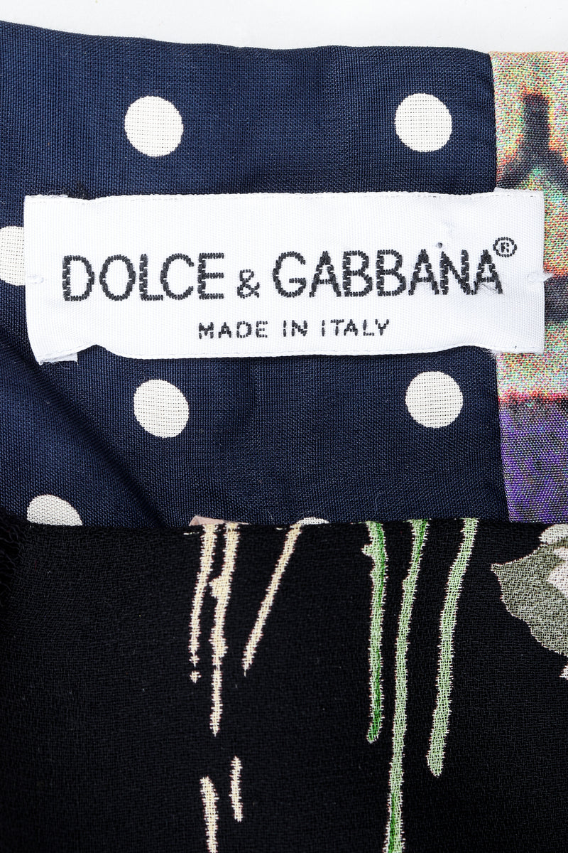 Recess vintage Dolce & Gabbana label on polka dot fabric