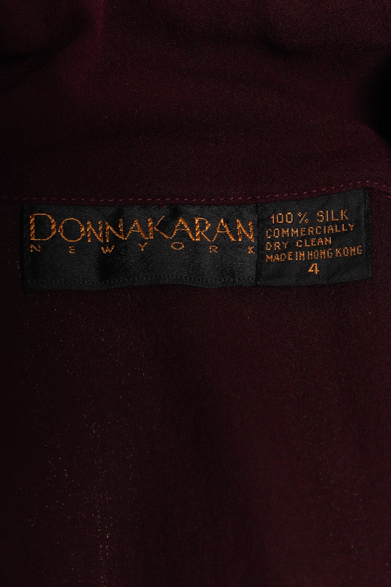 Vintage Donna Karan Silk Crepe Cowl Bodysuit label at Recess Los Angeles