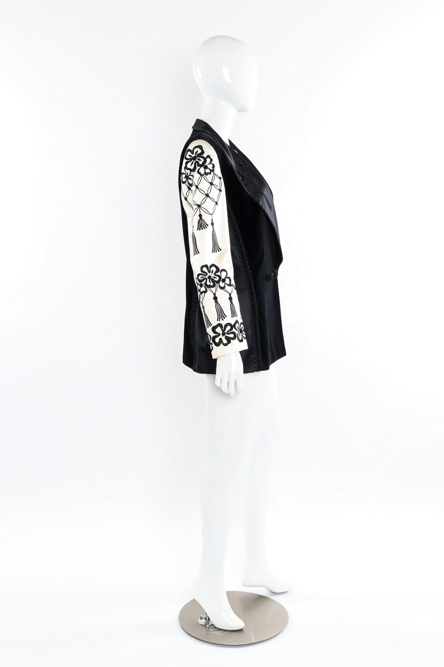 Embroidered longline blazer with contrast sleeves and wide silk lapel by Escadan mannequin side @recessla