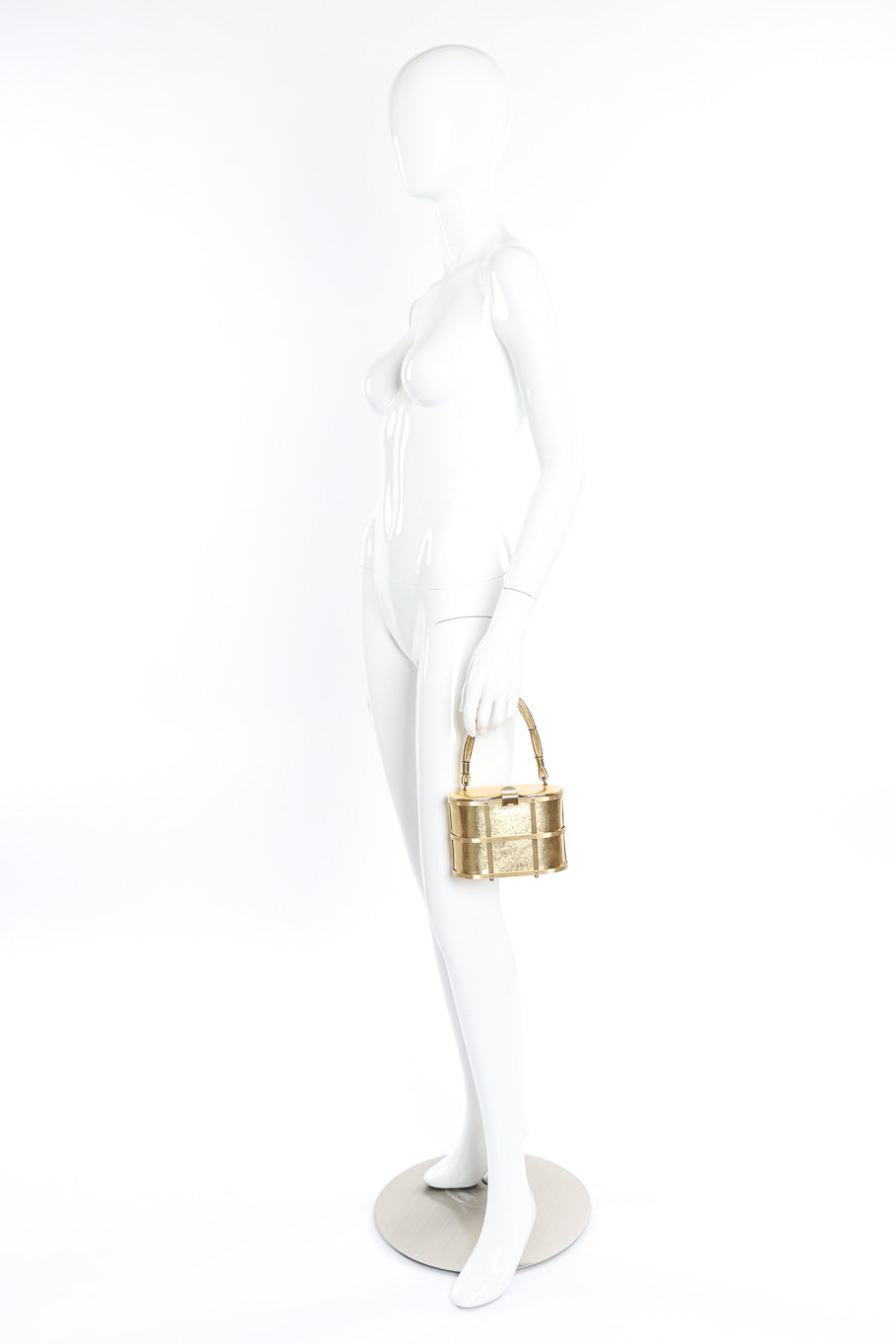 Etra metallic caged oval box bag on mannequin @recessla