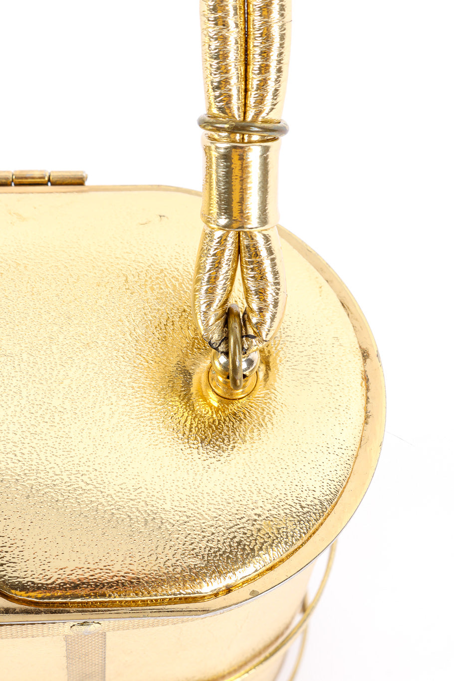 Etra metallic caged oval box bag handle detail @recessla