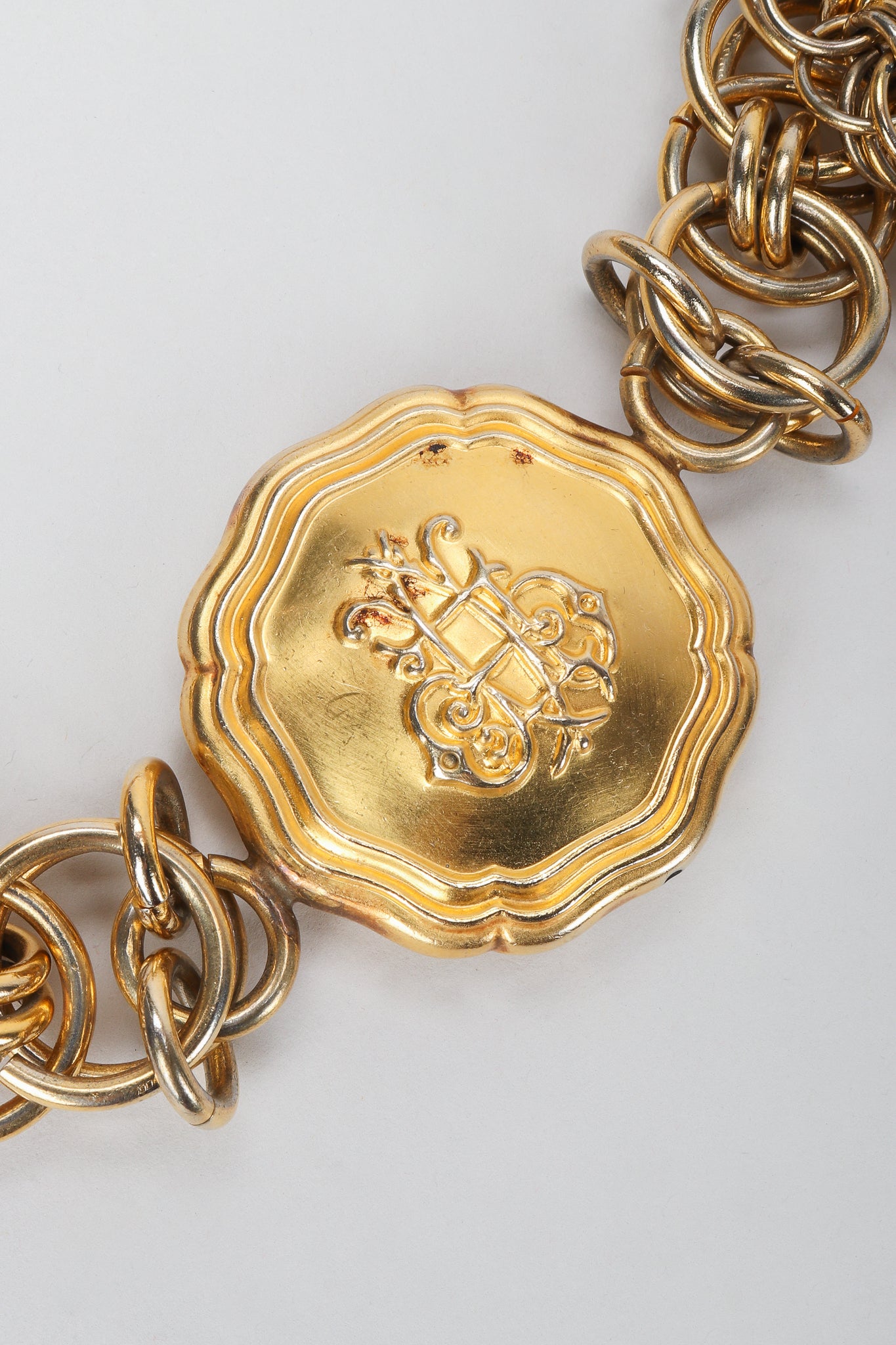 Vintage Emilio Pucci Gold Medallion Logo Close Up