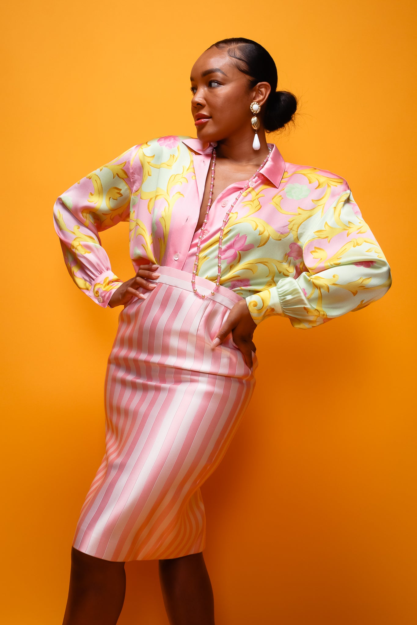 Brittany Hampton in Vintage Escada Pink Regency Candy Stripe Skirt on tangerine at Recess LA