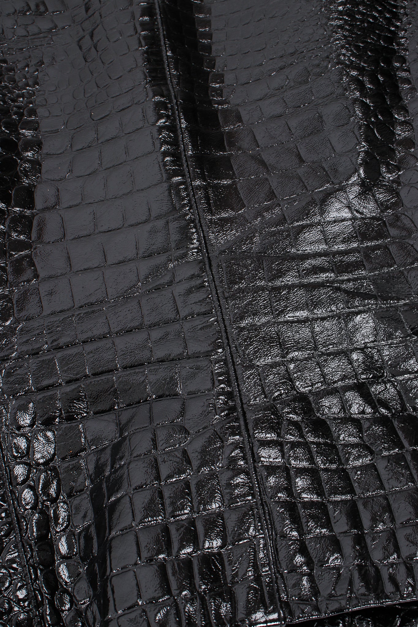 Vintage Escada Patent Leather Embossed Gator Jacket fabric texture and wear at Recess Los Angeles