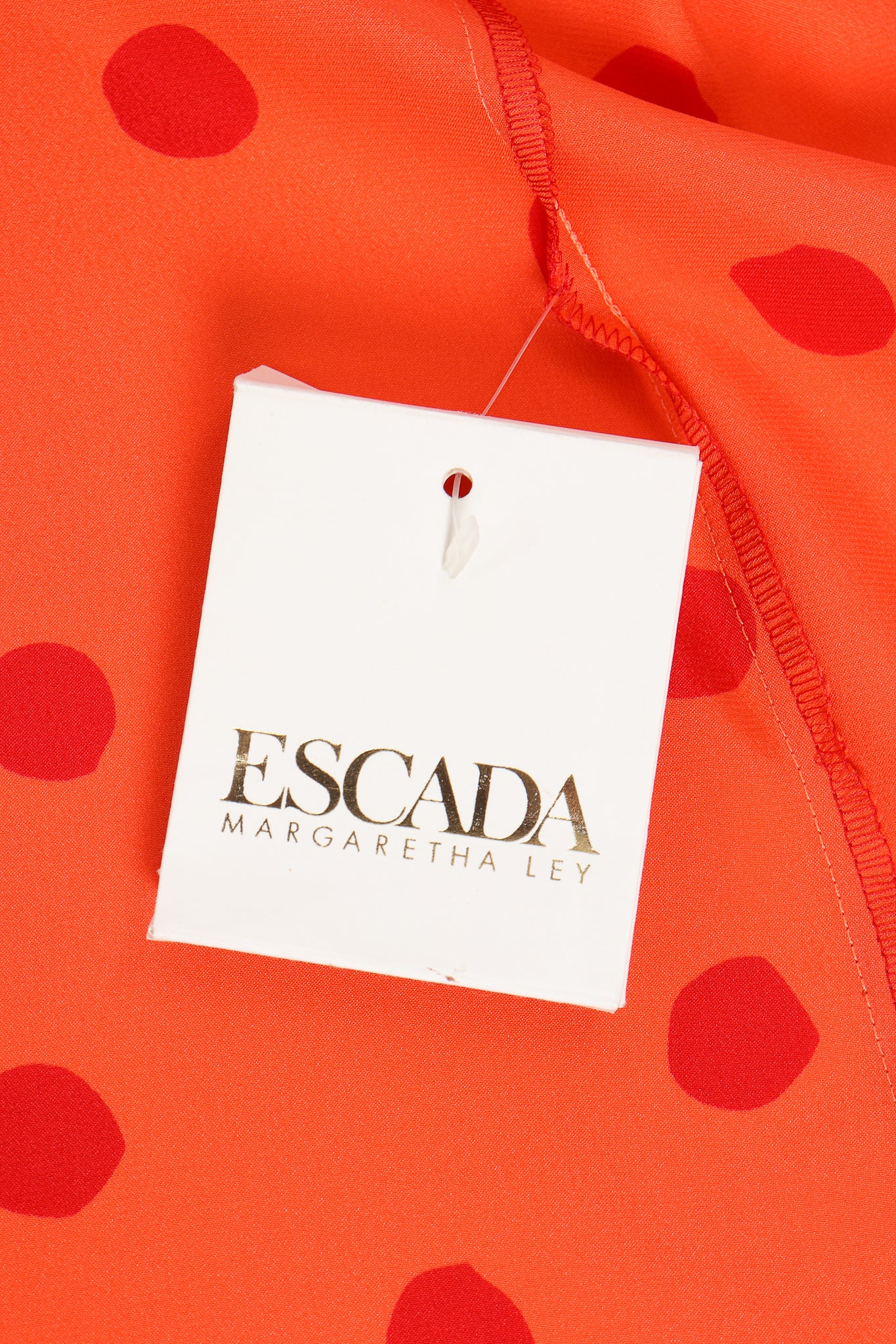 Vintage Escada Deadstock Fire Carnival Dot Satin Blouse label tag at Recess Los Angeles