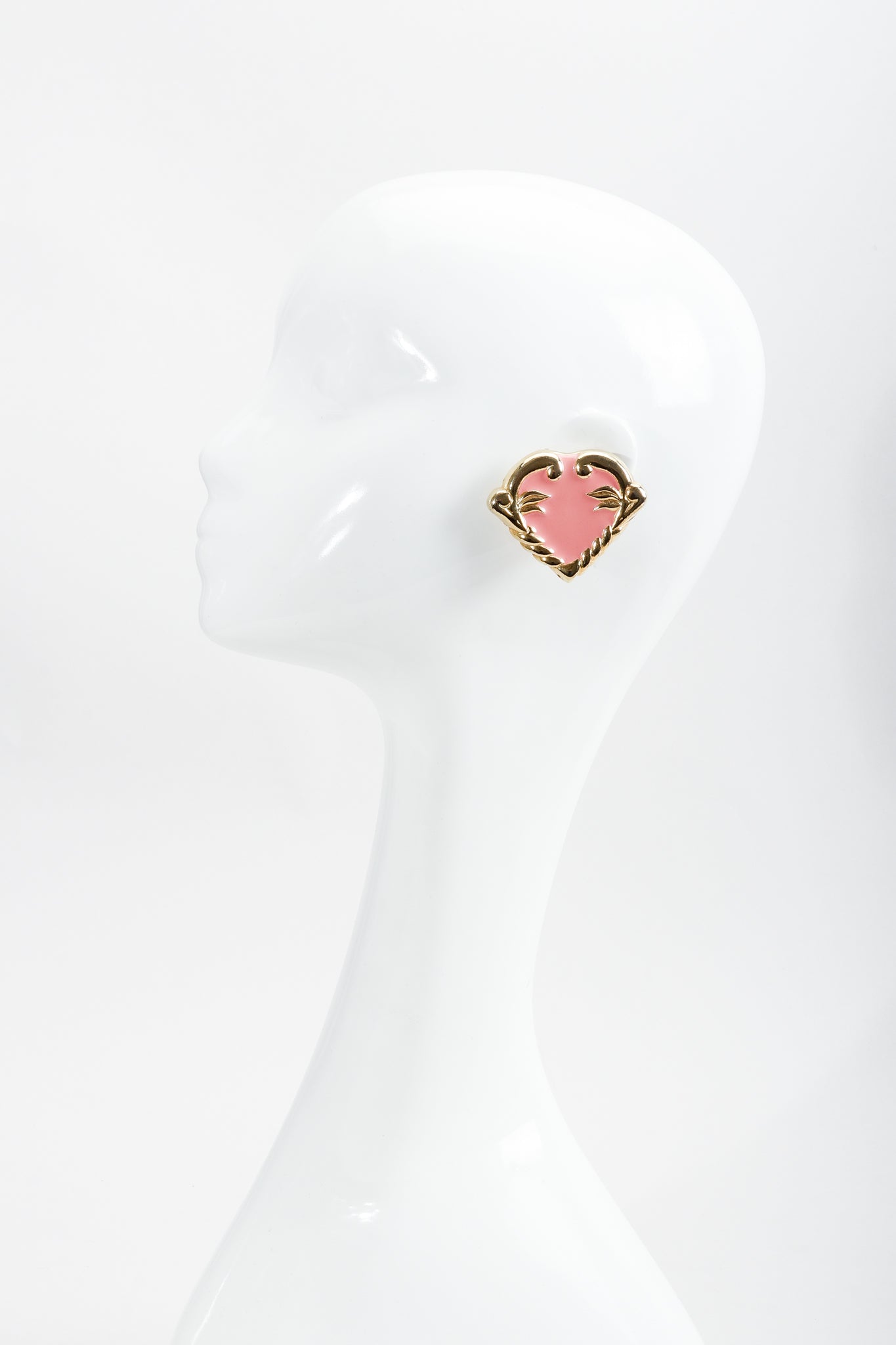 Vintage Escada Pink Enamel Heart Button Earrings on mannequin at Recess Los Angeles