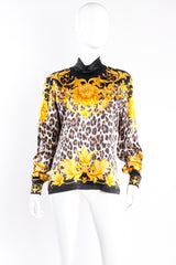 Vintage Escada Baroque Lion Cheetah Print Mock Neck Blouse on Mannequin front at Recess Los Angeles