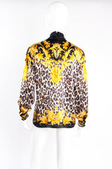 Vintage Escada Baroque Lion Cheetah Print Mock Neck Blouse on Mannequin back at Recess Los Angeles