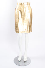 Vintage Escada Gold Leather Lamé Skirt on Mannequin front at Recess Los Angeles