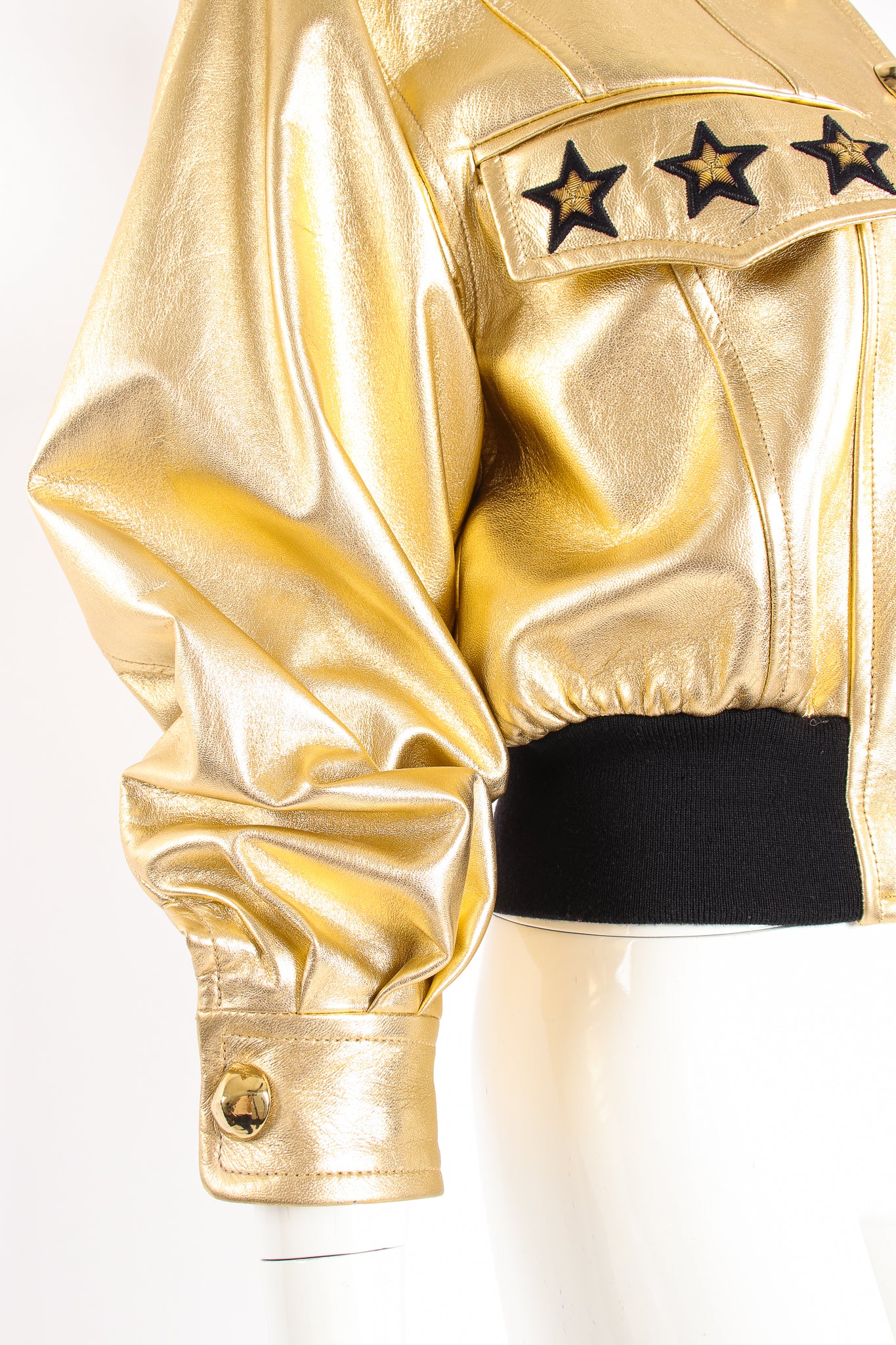 Vintage Escada Gold Star Leather Bomber Jacket on Mannequin sleeve cuff at Recess Los Angeles