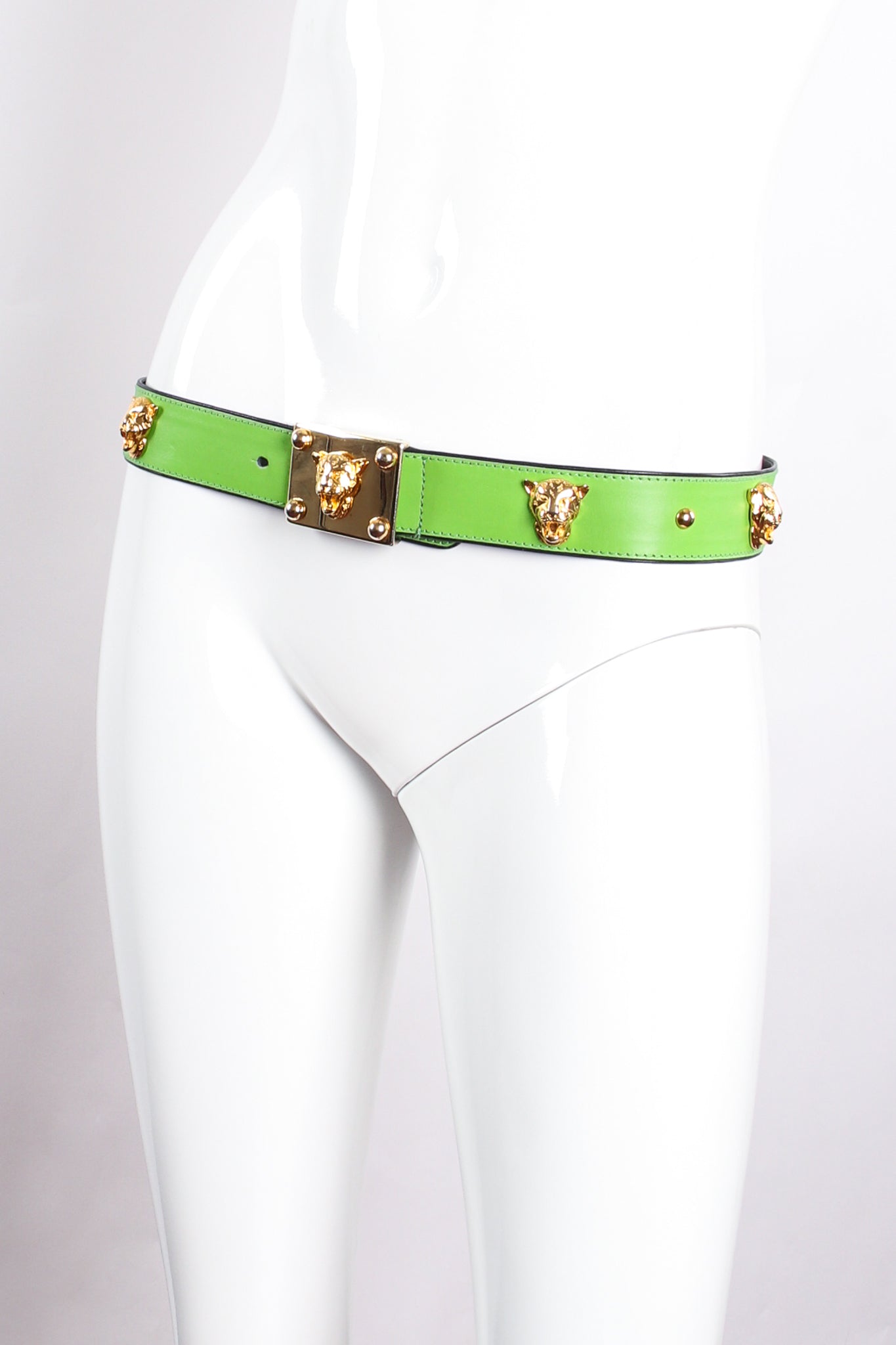 Vintage Escada Lime Leopard Stud Buckle Belt on mannequin at Recess Los Angeles