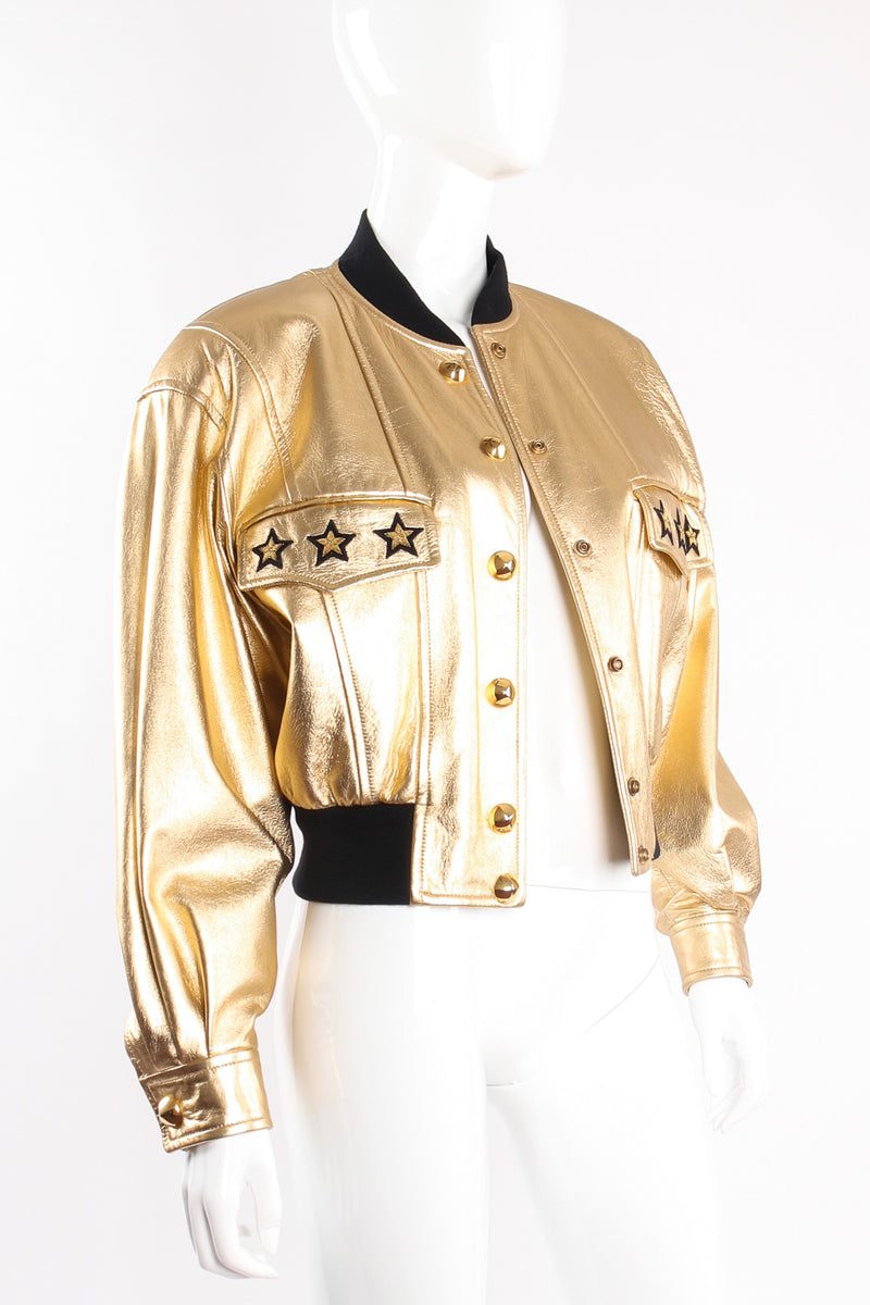 Vintage Escada Gold Star Leather Bomber Jacket on mannequin open at Recess Los Angeles