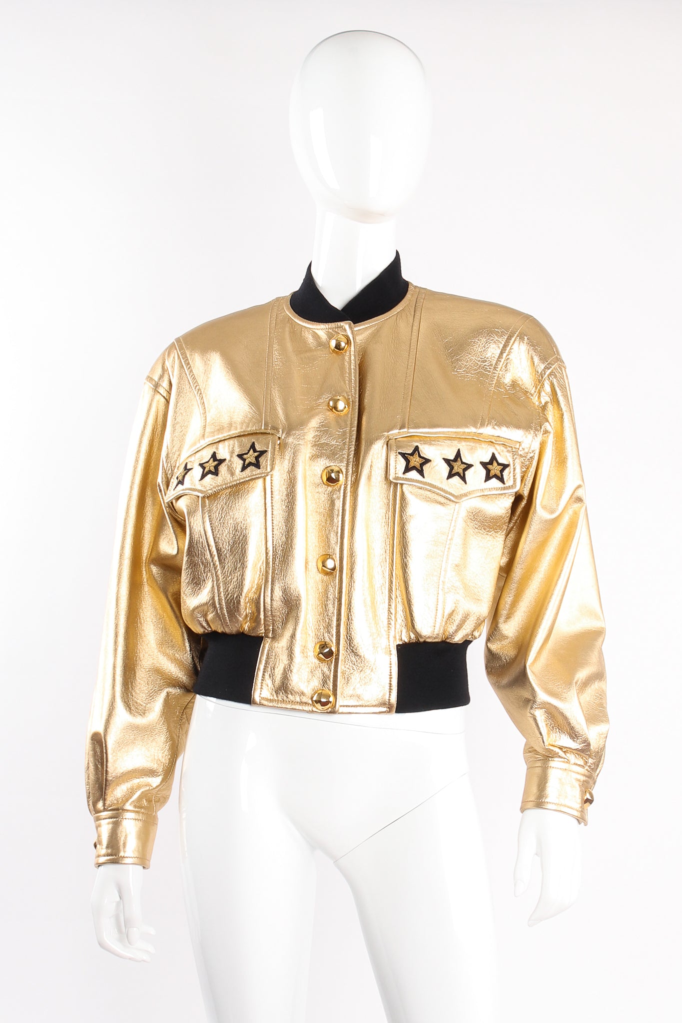 Vintage Escada Gold Star Leather Bomber Jacket on mannequin front at Recess Los Angeles