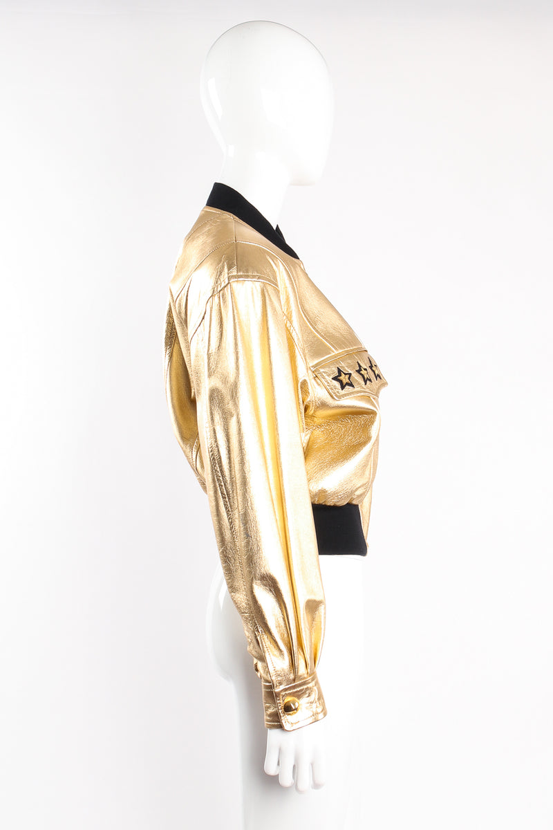 Vintage Escada Gold Star Leather Bomber Jacket on mannequin side at Recess Los Angeles