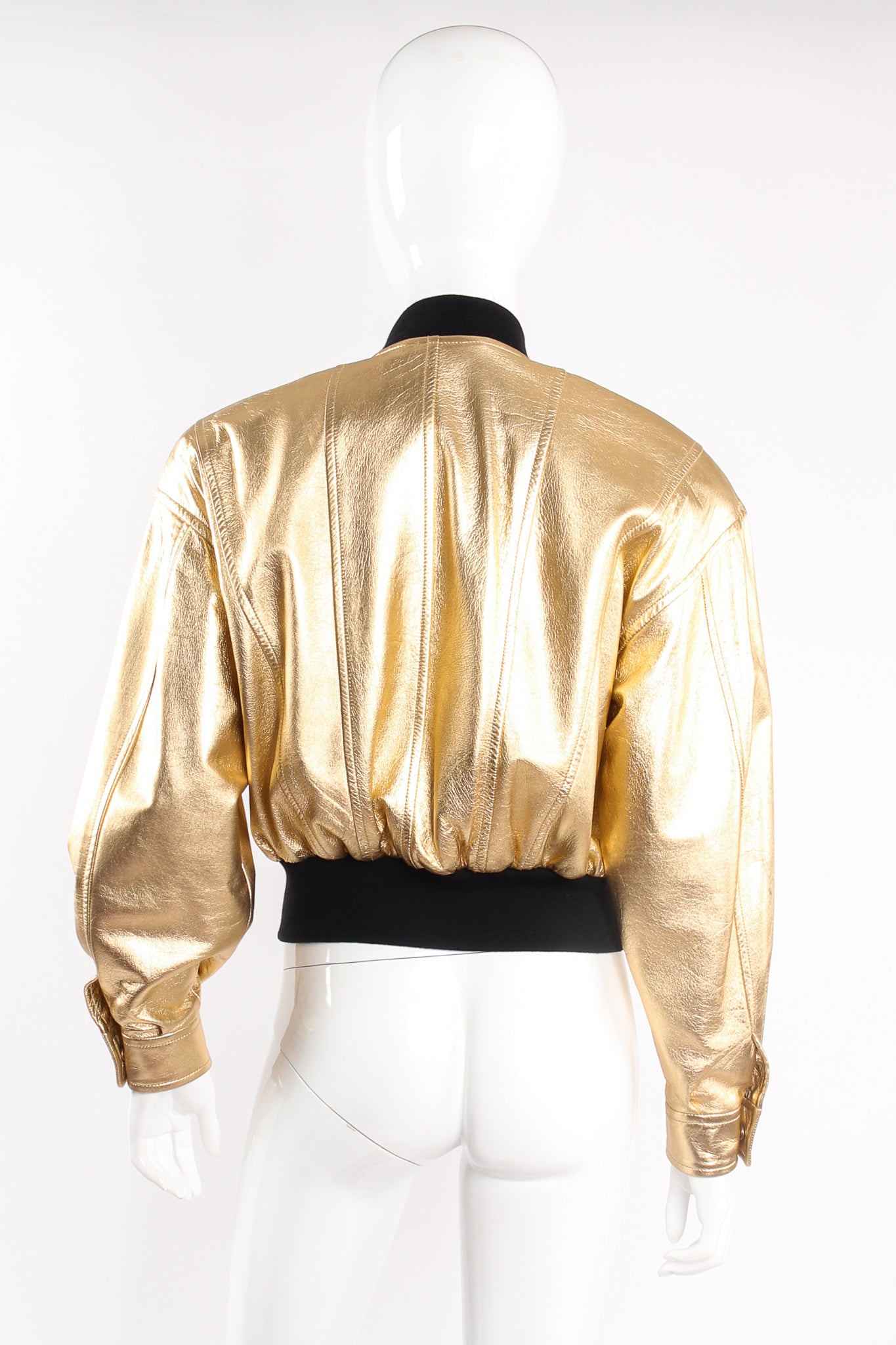 Vintage Escada Gold Star Leather Bomber Jacket on mannequin back at Recess Los Angeles