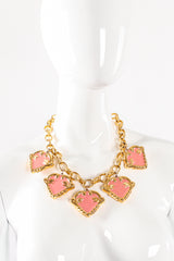 Vintage Escada Pink Enamel Hearts Charm Necklace on mannequin at Recess Los Angeles