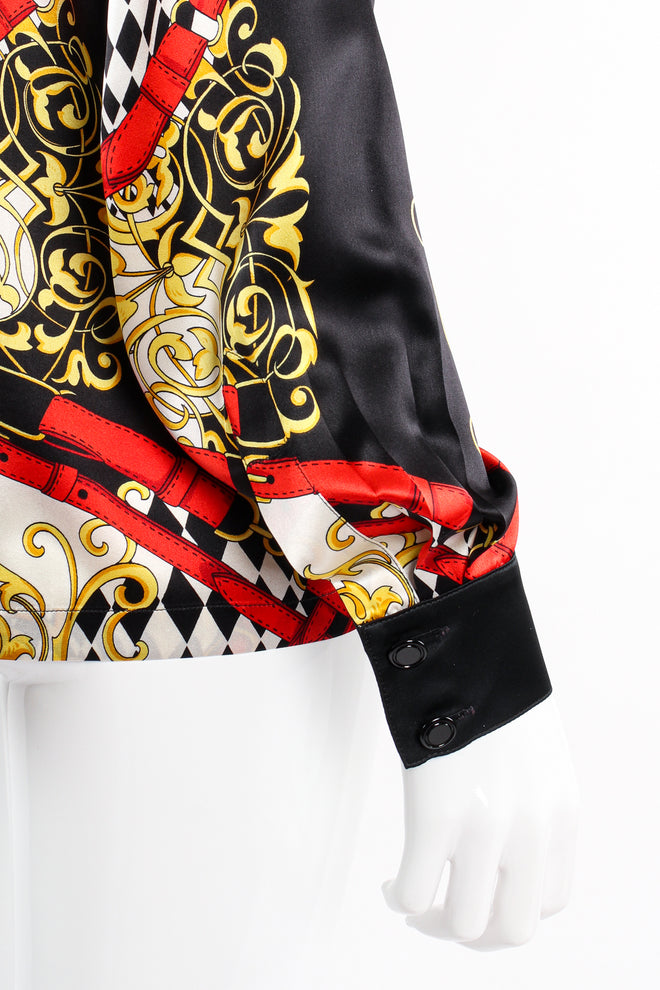 Vintage Escada Baroque Belt Print Mock Neck Blouse on mannequin sleeve at Recess Los Angeles