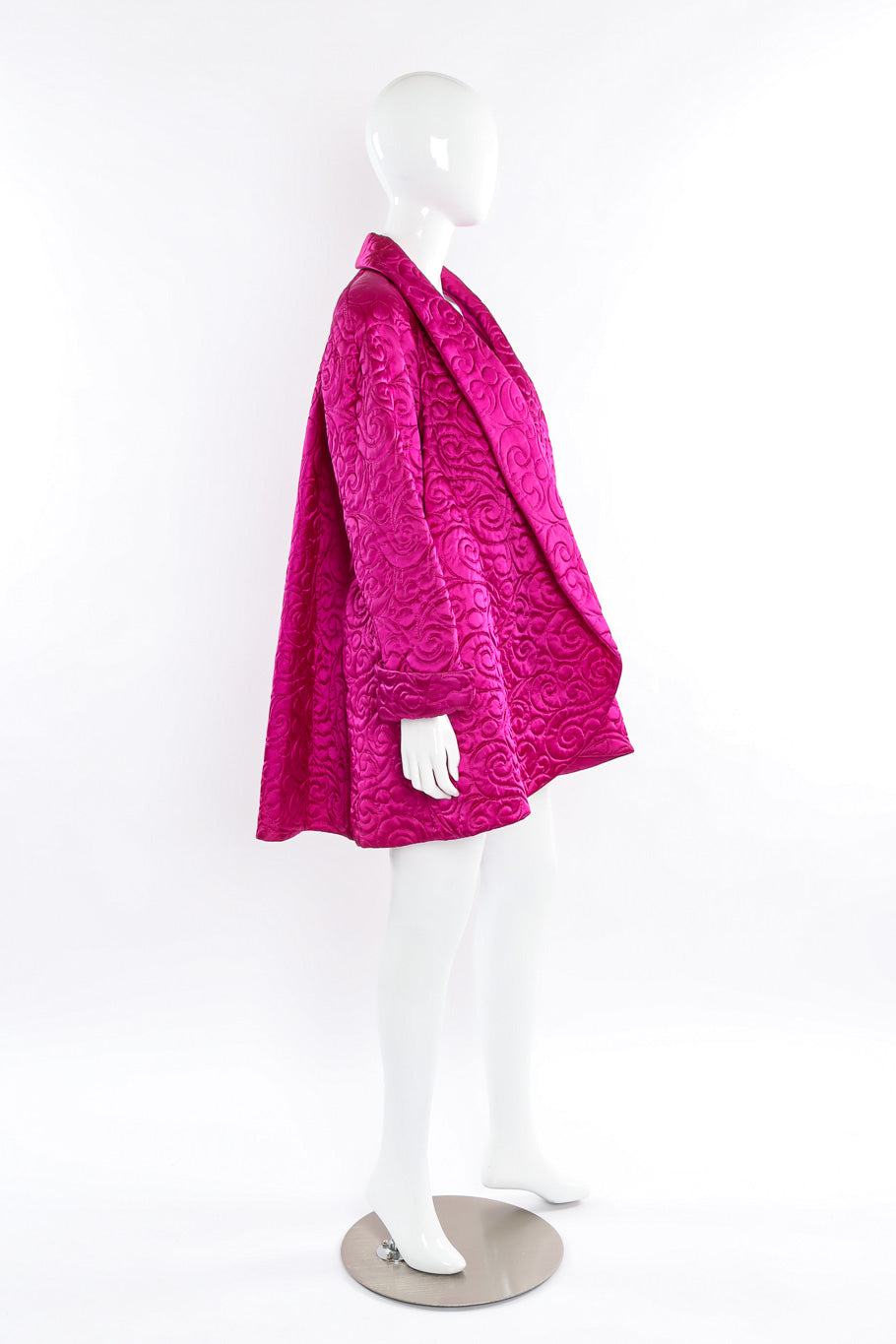 Plush oversized swirl quilted swing coat by Farinae Collection mannequin side view @recessla