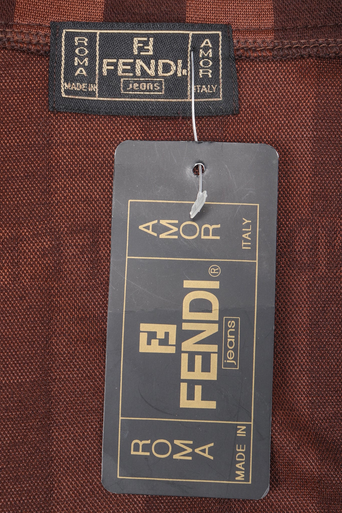 Recess Vintage Fendi Label and tag on Brown Knit fabric