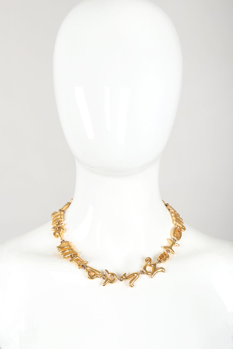 Recess Vintage Fendi Gold Astrology Symbol Collar Necklace on Mannequin