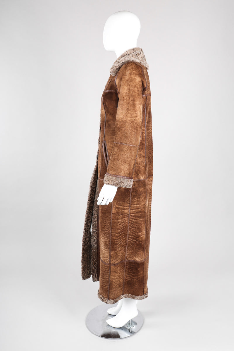 Louis Feraud Vintage Shearling Coat, $1,499, farfetch.com