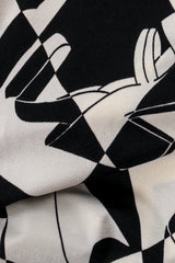 Vintage Salvatore Ferragamo Harlequin Shoe Print Jumpsuit fabric detail at Recess Los Angeles