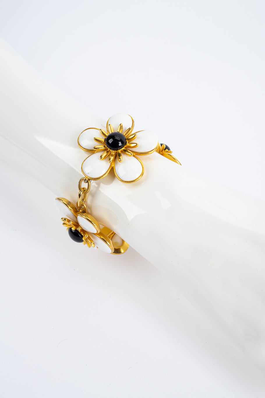 Flower bracelet and earring set by Ben Amun mannequin wrist close @recessla