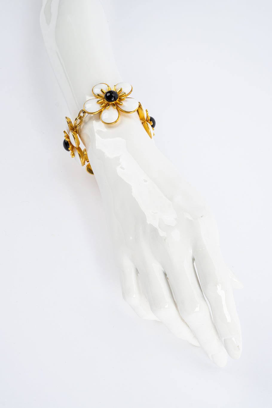 Flower bracelet and earring set by Ben Amun mannequin wrist @recessla