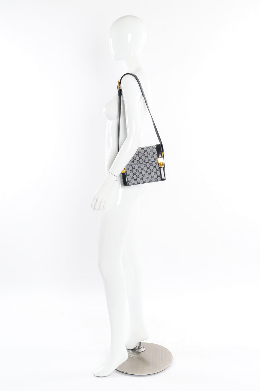 Gucci monogram shoulder bag on mannequin @recesla