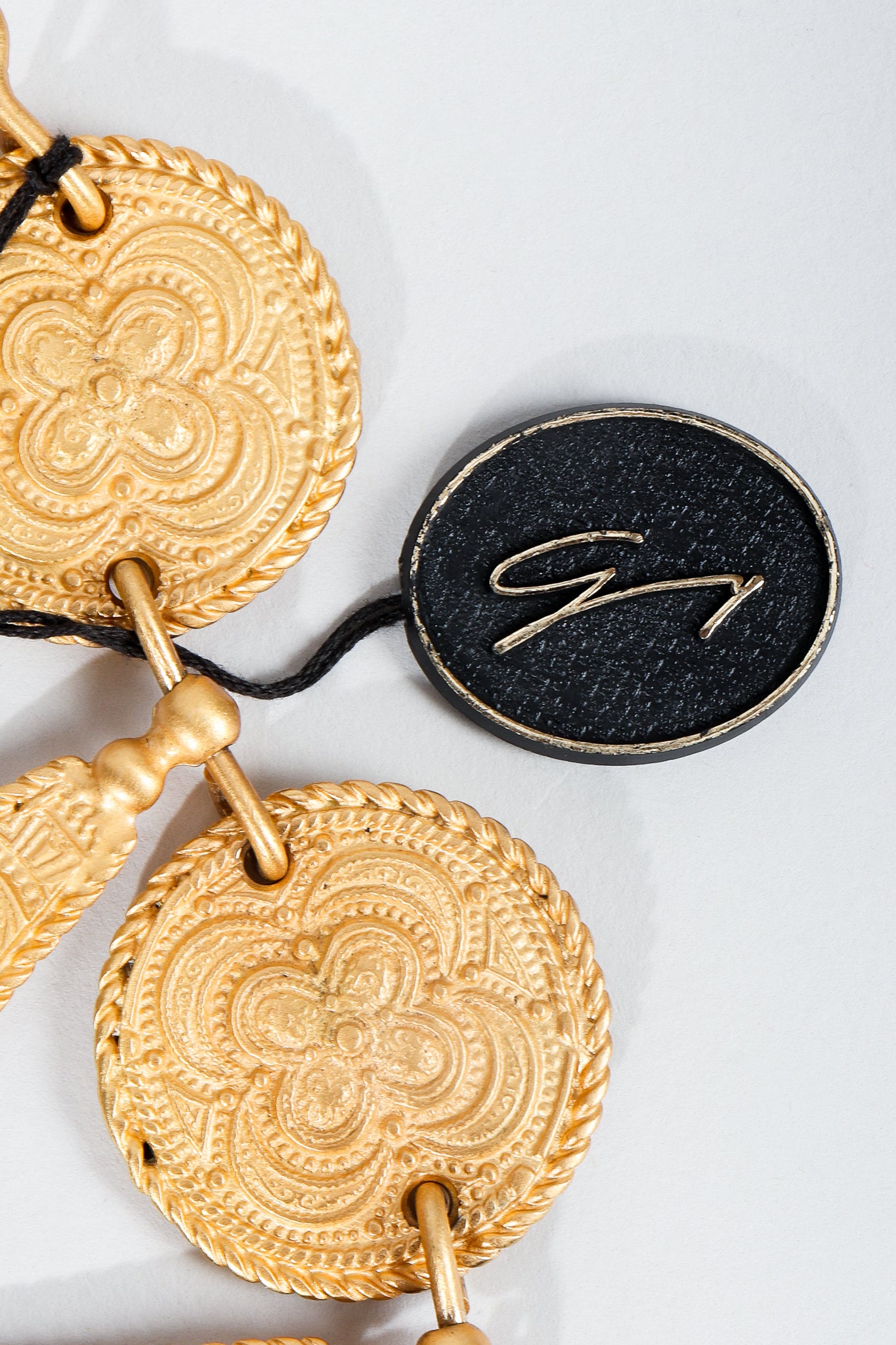 Vintage Genny Hangtag Charm label on matte gold necklace