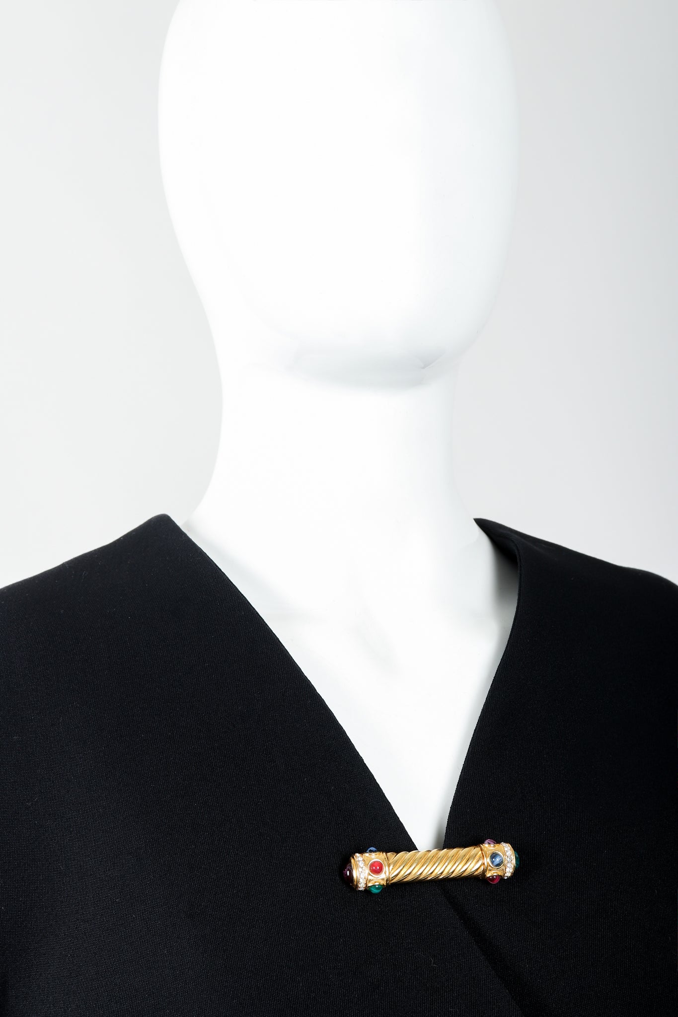 Vintage Givenchy Jeweled Gold Braid Bar Brooch Pin on black jacket at Recess Los Angeles