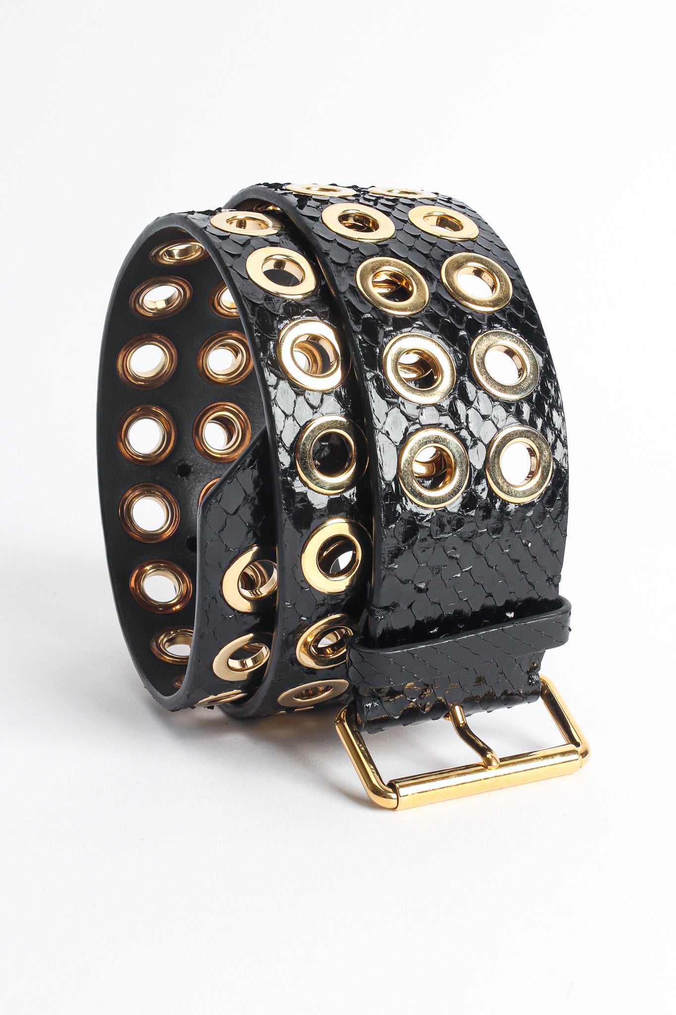 Vintage Givenchy Grommet Croc Patent Leather Belt rolled close up @ Recess Los Angeles
