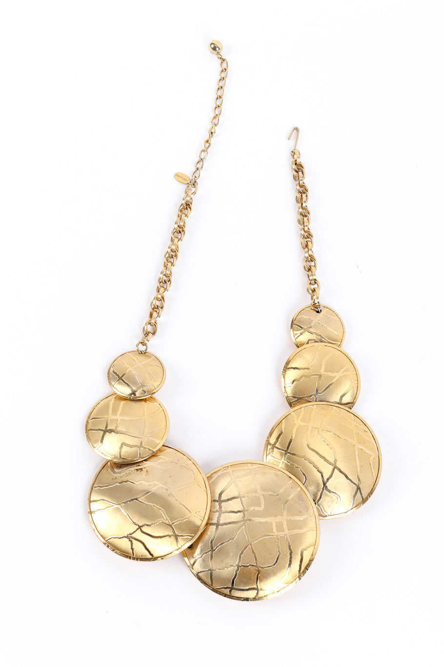 Disc necklace by Parklane flat lay on white background @recessla
