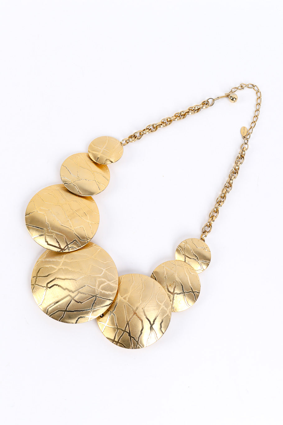 Disc necklace by Parklane flat lay clasped @recessla