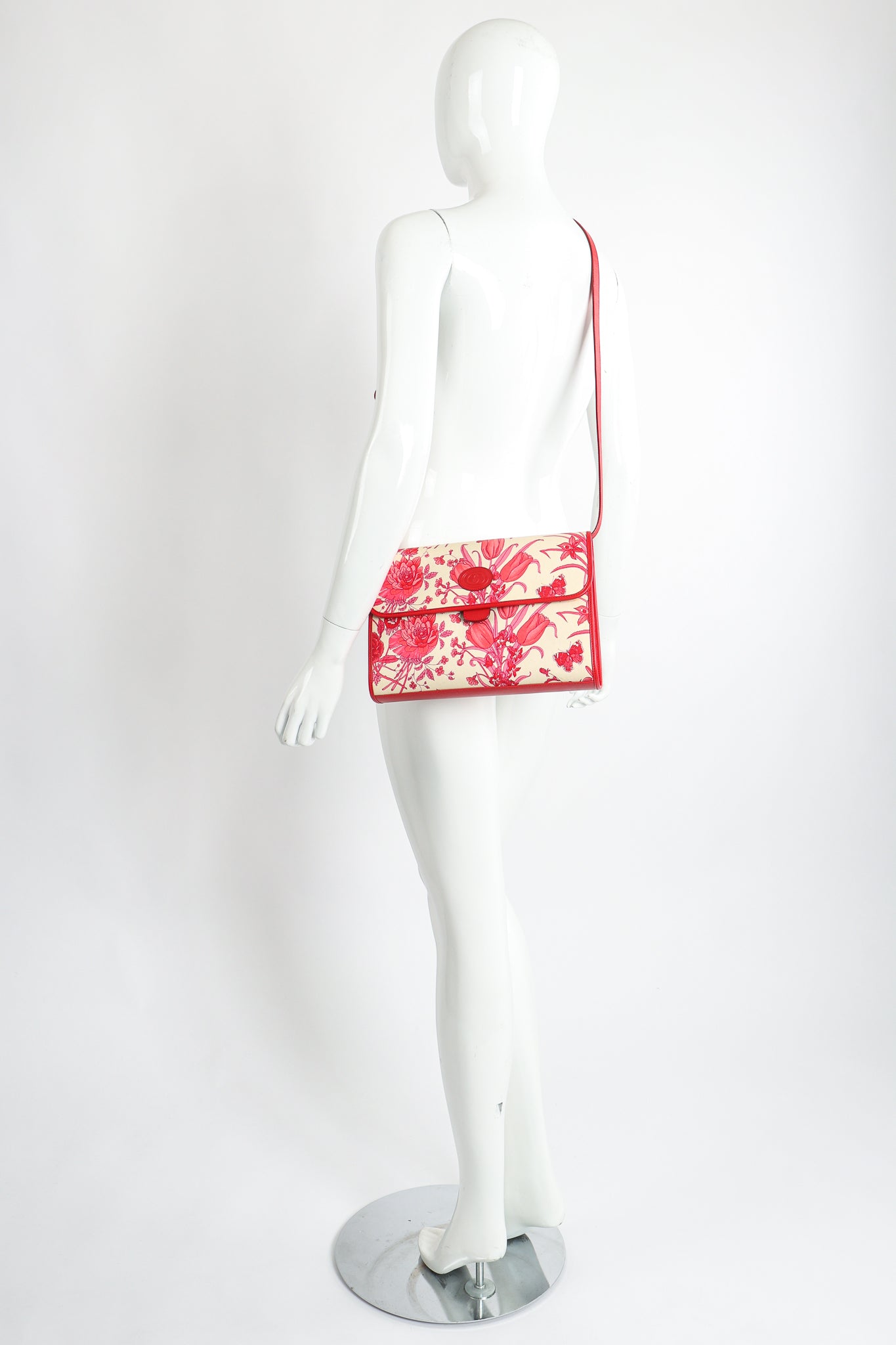 Vintage Gucci Red Flora Convertible Clutch on Mannequin Crossbody at Recess Los Angeles