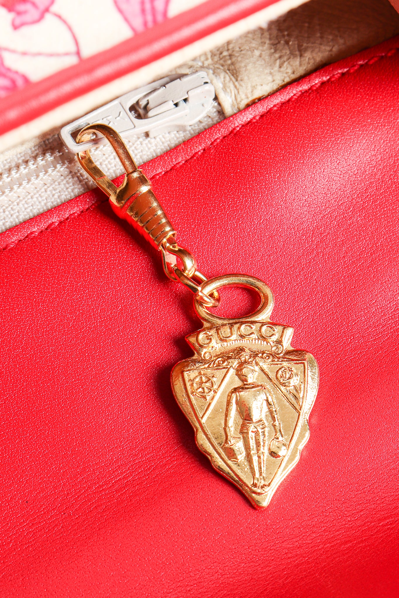Vintage Gucci Red Flora Convertible Clutch gold logo zipper pull at Recess Los Angeles