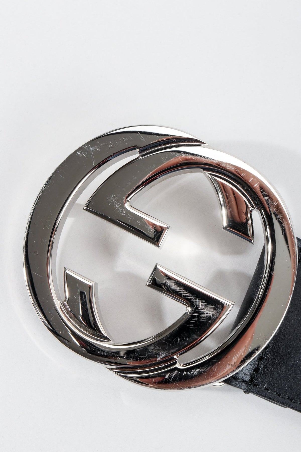Gucci belt symbol hotsell