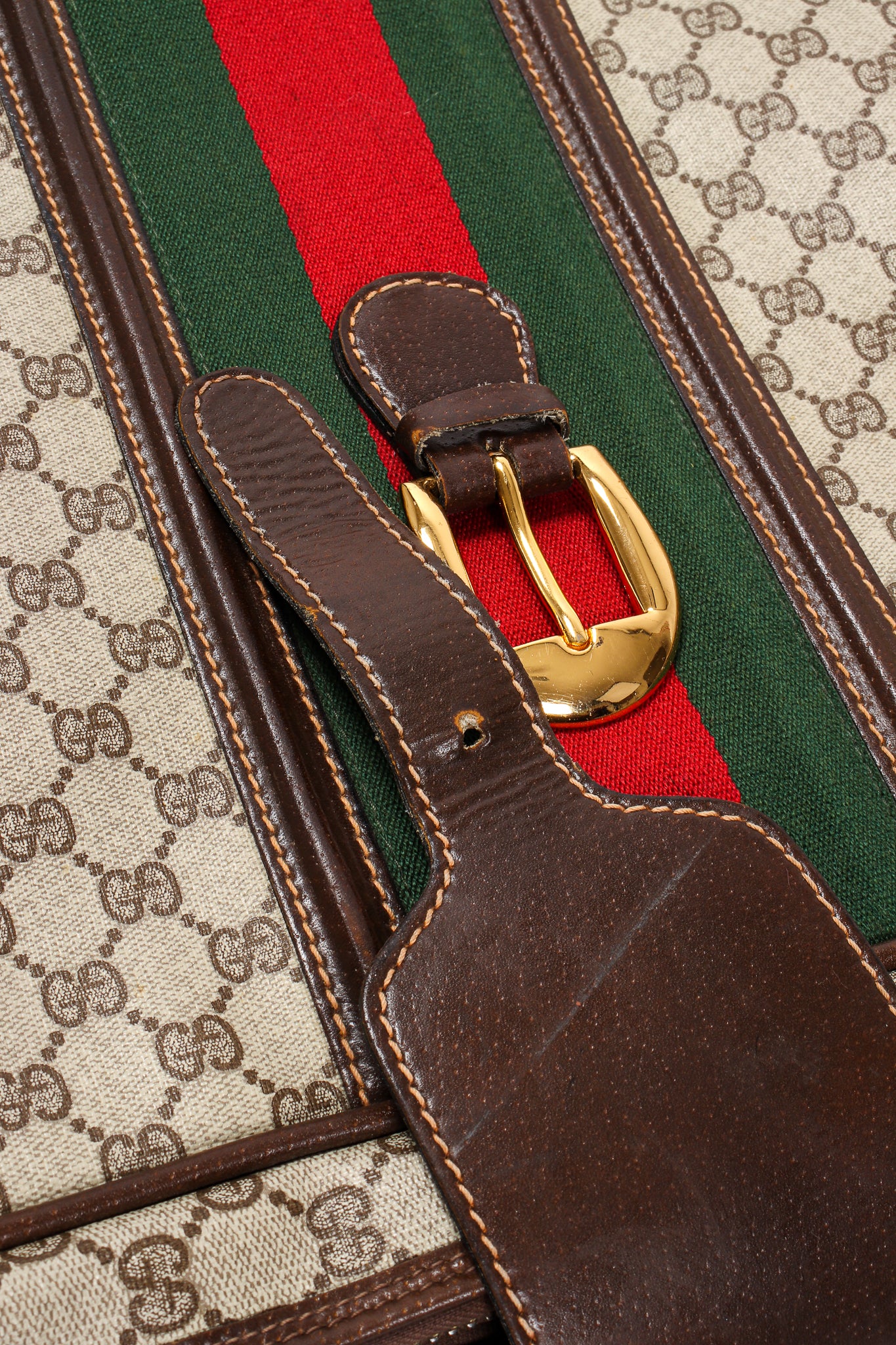 Vintage Gucci Monogram Stripe Suitcase buckle tab wear at Recess Los Angeles