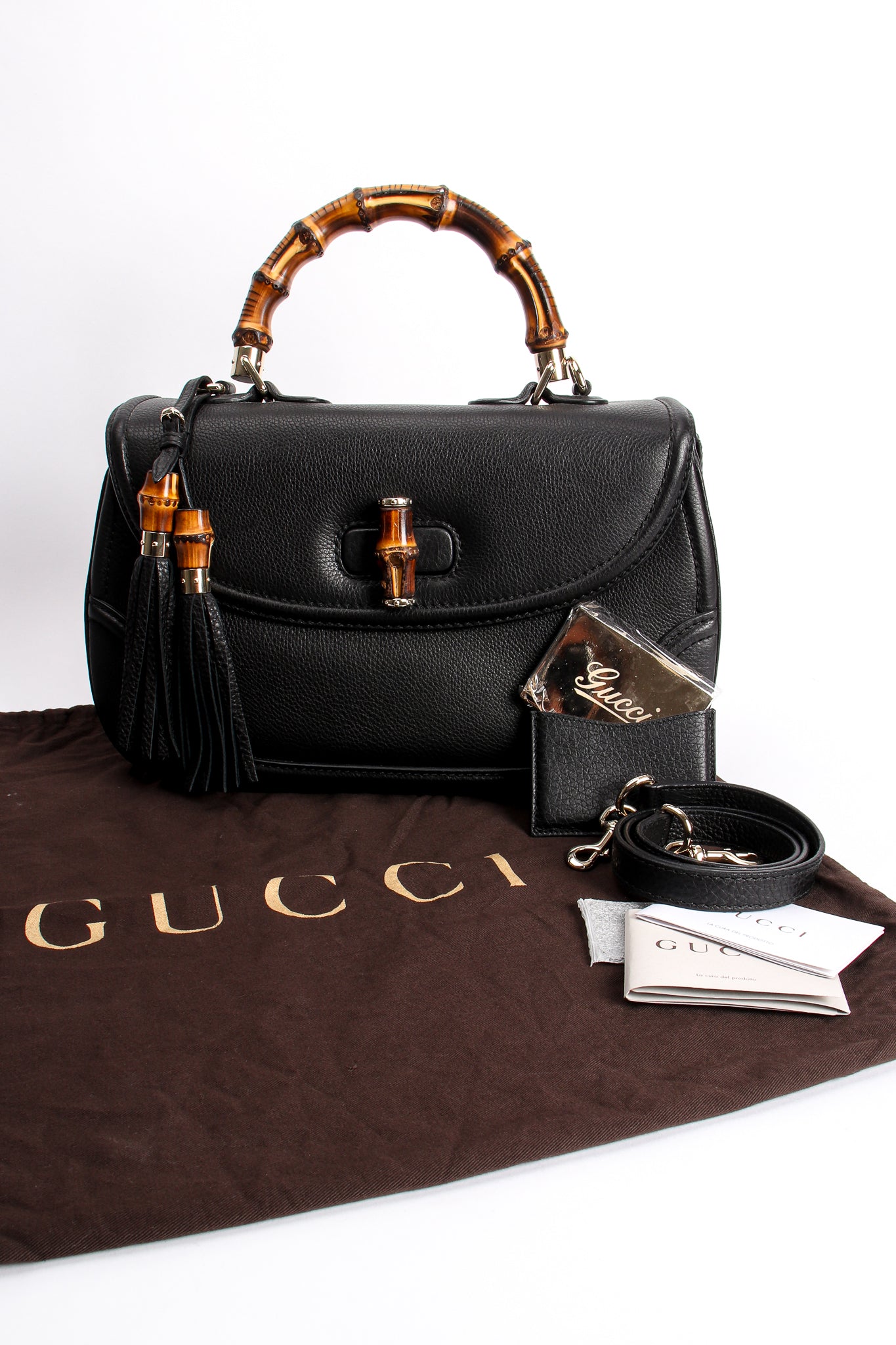 Vintage Gucci Leather Bamboo Handle Bag with Tassels and original accessories at Recess Los Angeles