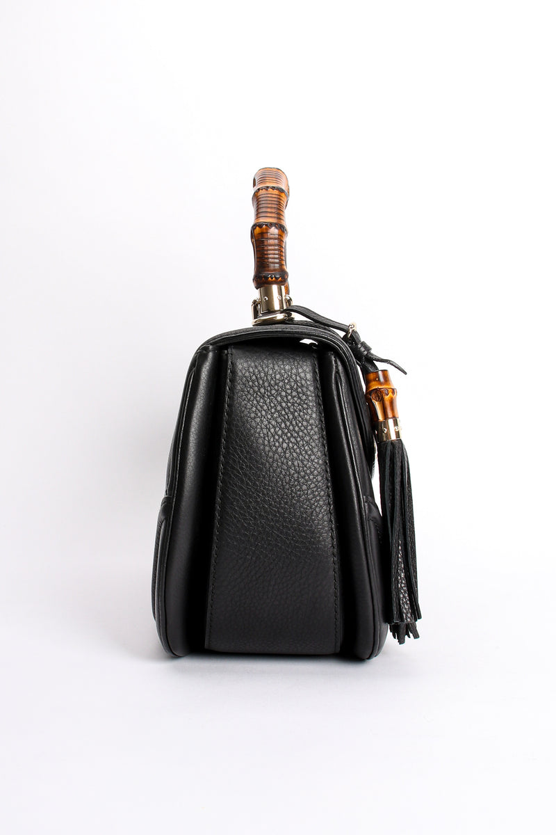 254884 Tassel Bamboo Top Handle Leather Bag