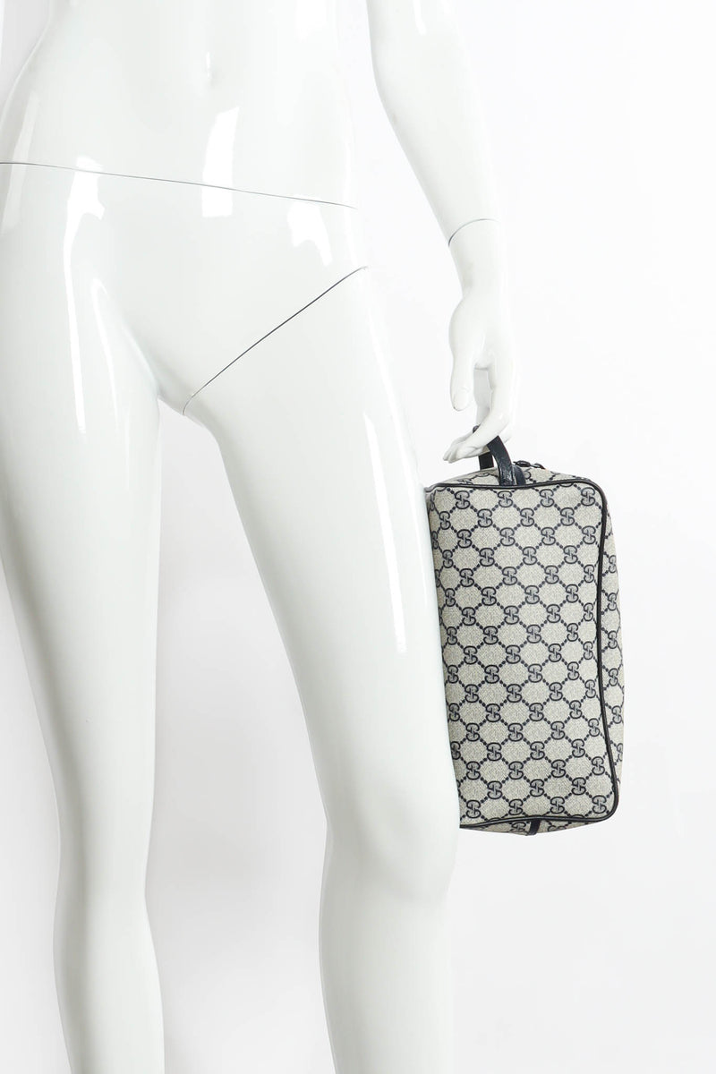 Vintage Gucci GG Monogram Travel Bag Case on mannequin hand @ Recess Los Angeles