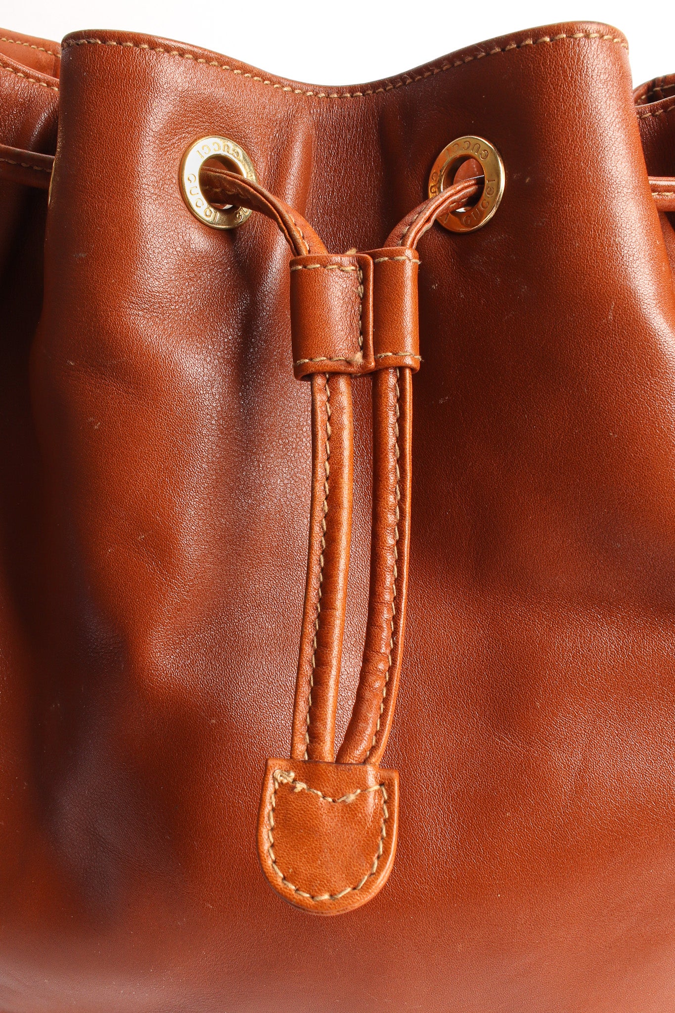 Vintage Gucci Drawstring Leather Bucket Bag drawstring pull @ Recess LA