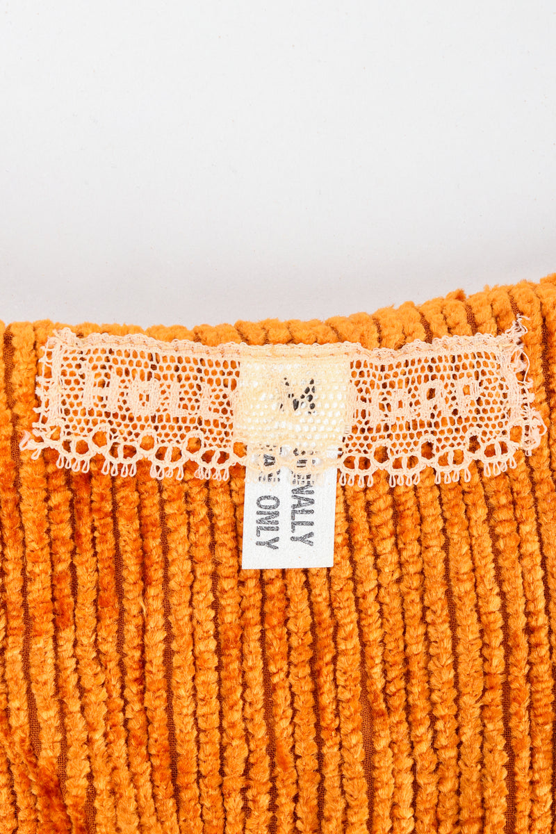 Vintage Hollys Harp lace label on orange jacket