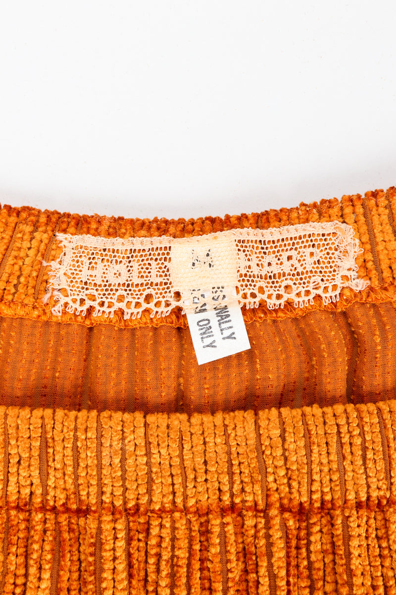Vintage Hollys Harp lace label on orange skirt