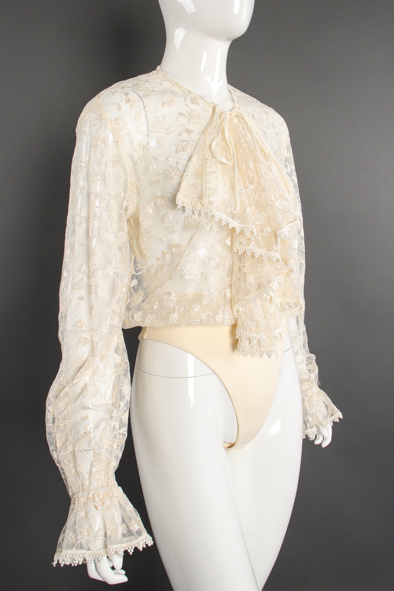 Vintage I.Magnin RBG Sheer Lace Jabot Bodysuit on Mannequin angle at Recess Los Angeles