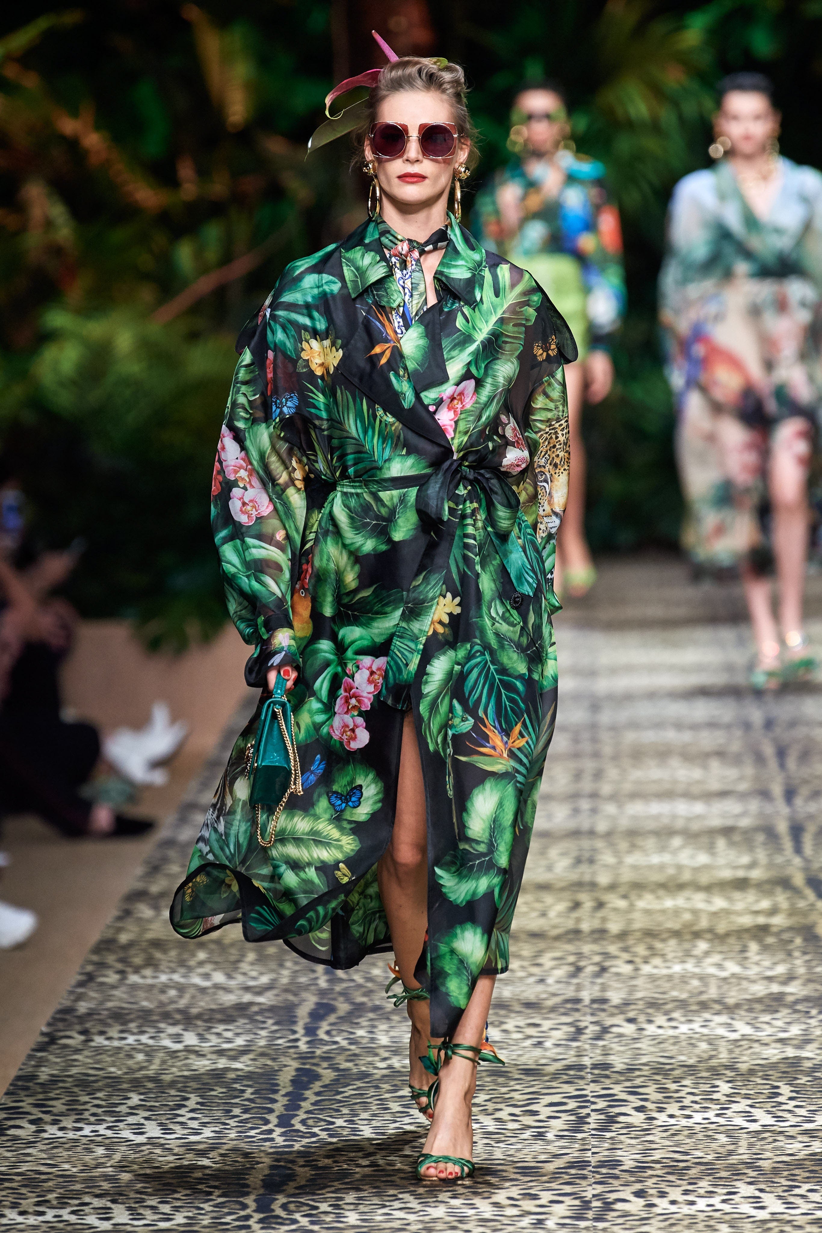 Model on runway for Dolce and Gabbana Spring 2020 wearing jacket with skirt print